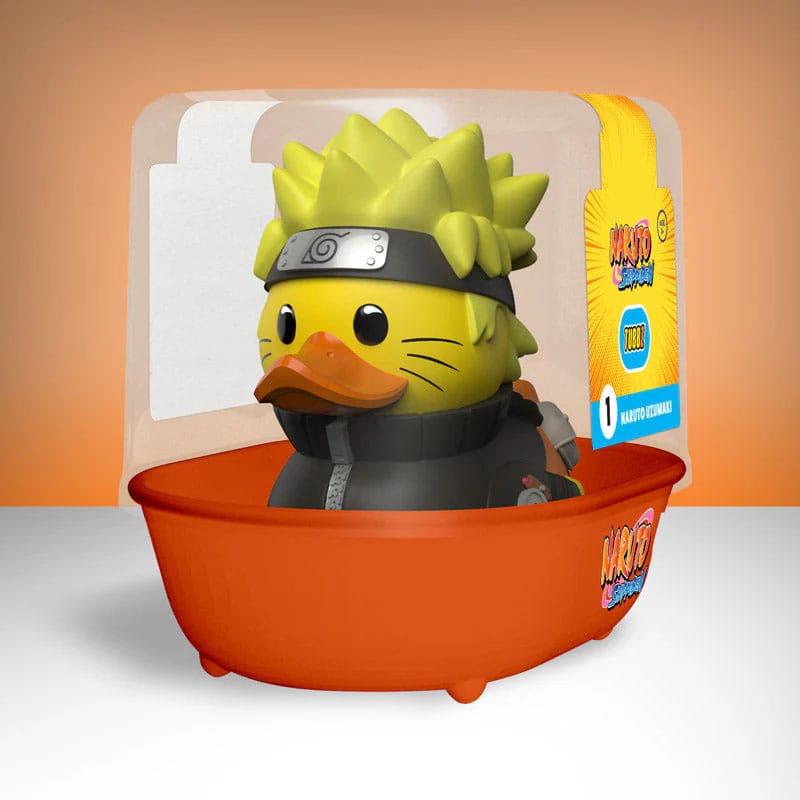 Figur einer Ente im Naruto-Uzumaki-Stil mit Stirnband und orange-schwarzer Jacke.