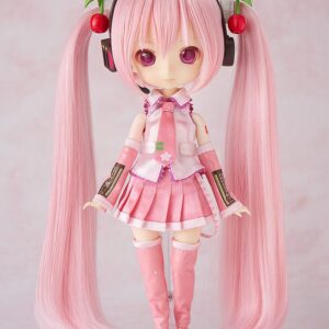 Good Smile Company Harmonia humming Puppe von Sakura Miku in rosa Stoffkleidung mit Kirschen-Haarschmuck.