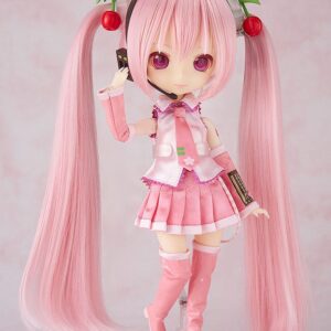 Good Smile Company Harmonia humming Puppe von Sakura Miku in rosa Stoffkleidung mit Kirschen-Haarschmuck.